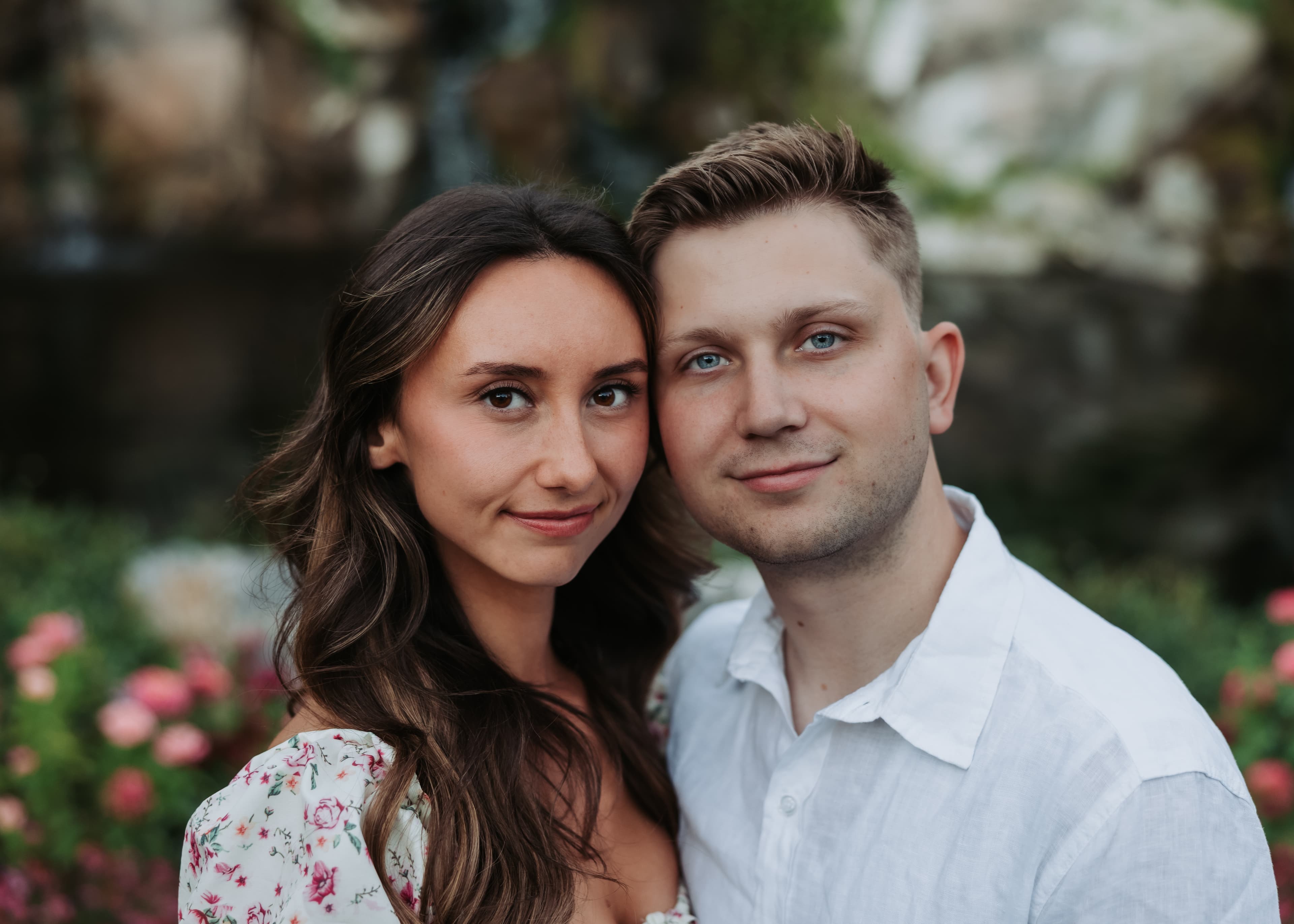 A close portrait of Bre and Bronson together in the garden